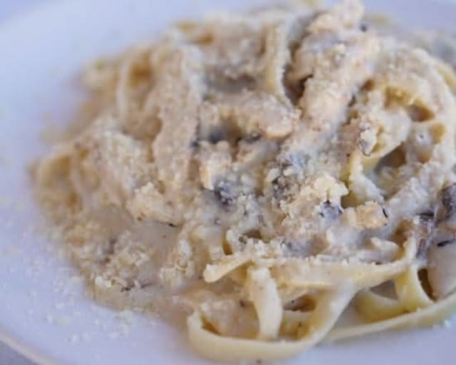 Fettuccine Alfredo with Chicken and Mushrooms.